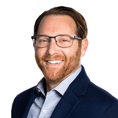 Headshot of Alex Fichera. He has short brown hair. He is wearing a suit jacket and blue shirt. He is wearing glasses and is smiling. 