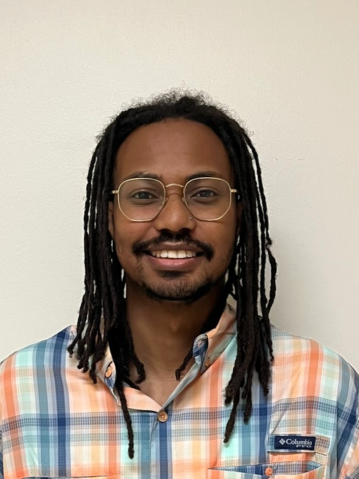 Headshot of Niko Sims
