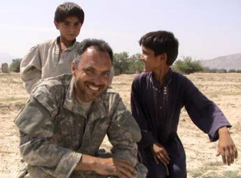 Mervyn Roberts in a U.S. Army Combat Uniform (ACU) featuring the Universal Camouflage Pattern (UCP).