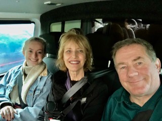 Three people in a helicopter