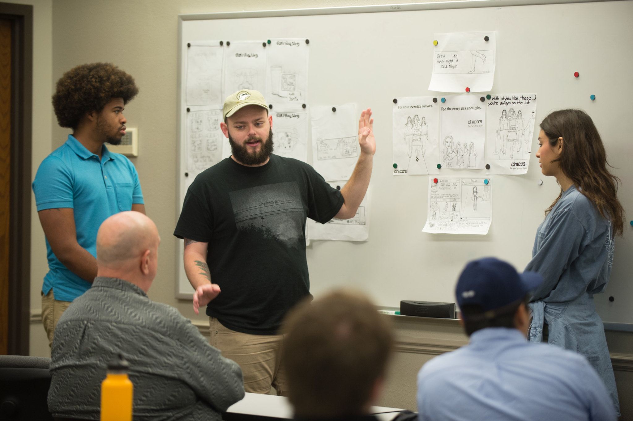 students planning at a whiteboard