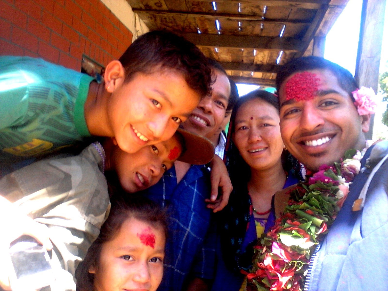 Aerin Philip and his Peace Corps host family.