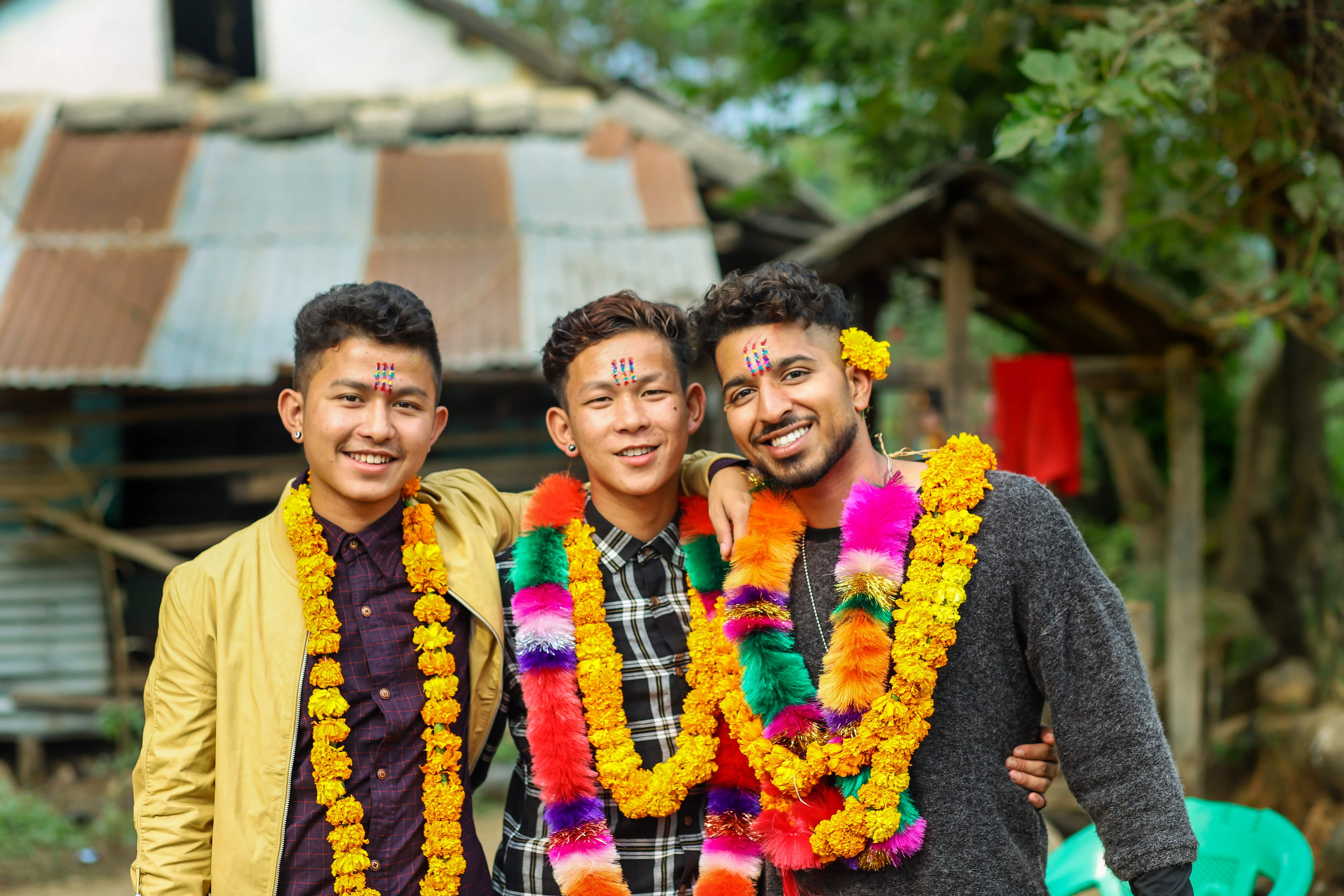 RPCV Aerin wearing leis with other Nepalese Host Country Nationals