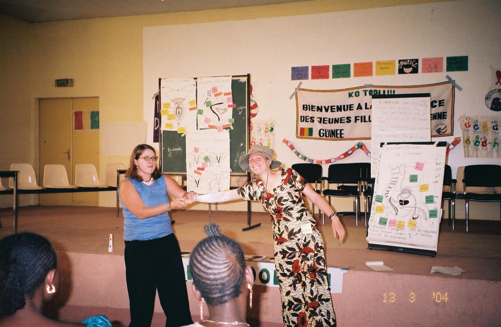Elinor and another volunteer teach a workshop.