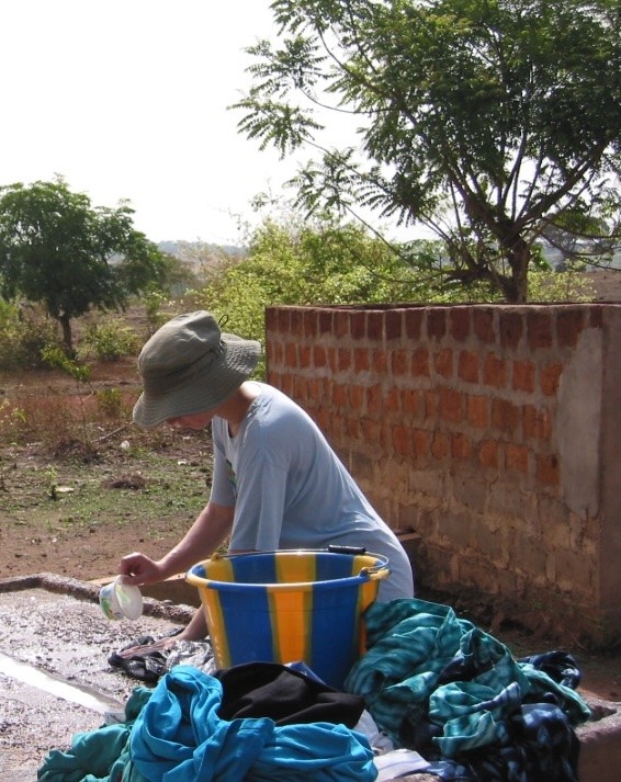 Dr. Lichtenberg washes clothes at the communal laundry platform