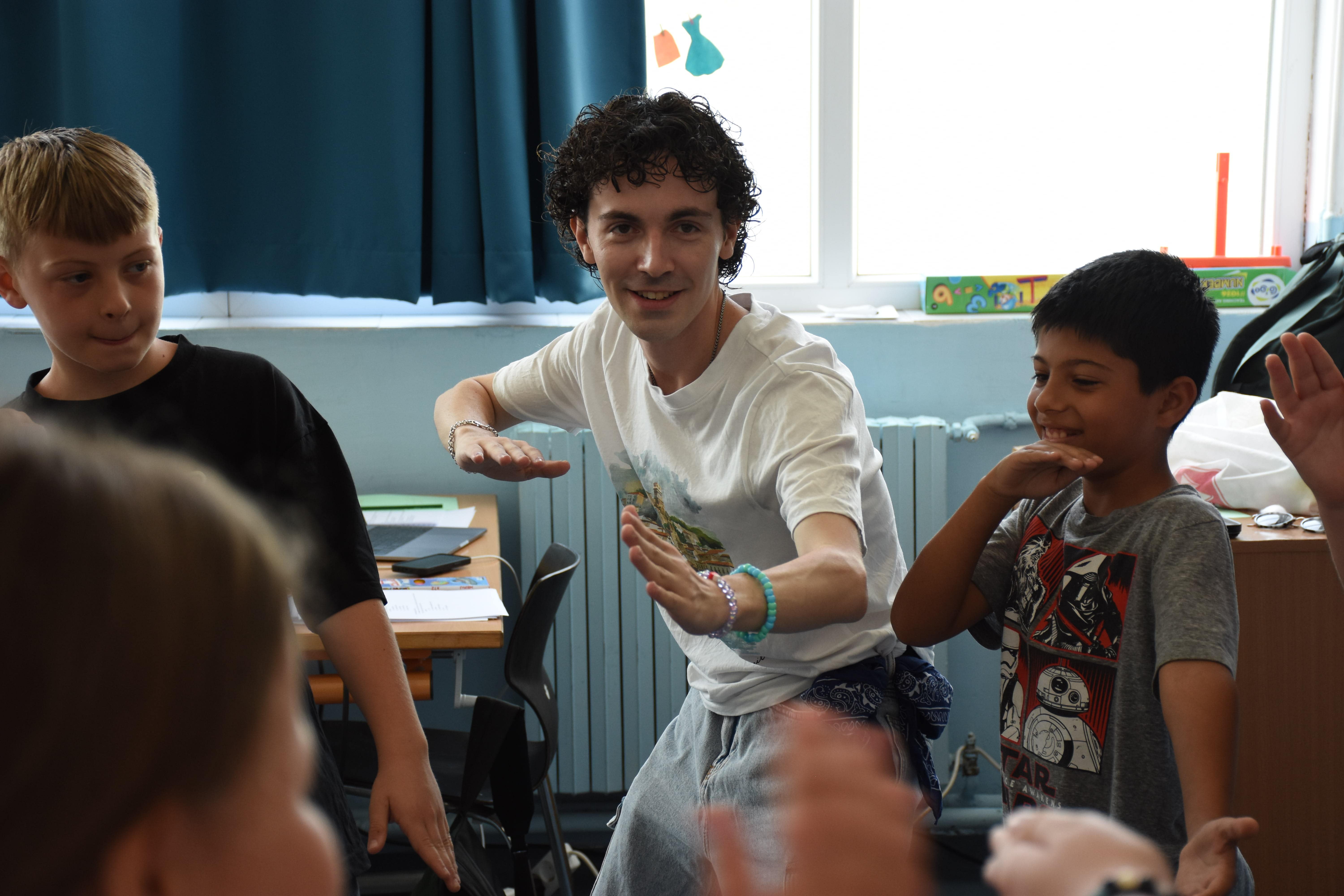 Jordan Mitchell teaching children.