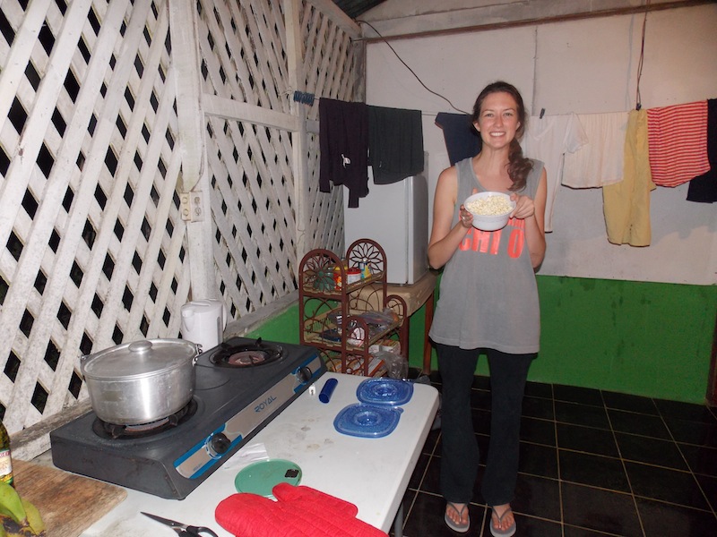 Leigh shows off a dish she made in her kitchen.