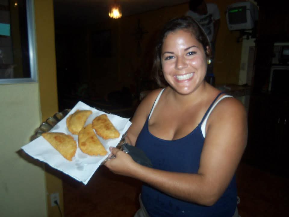 Liani and a batch of empanadas she cooked