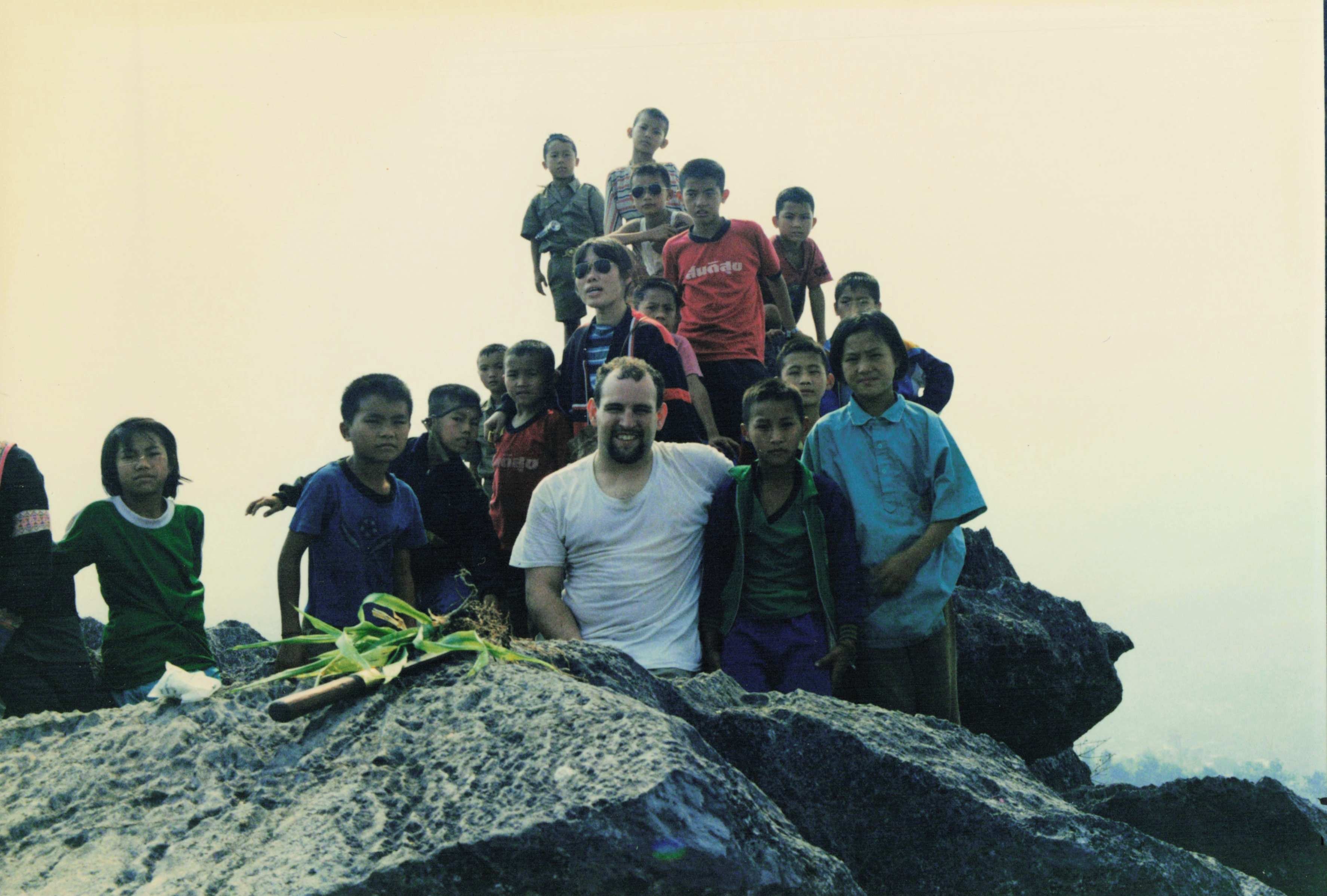 Dr. Baysden with local students.