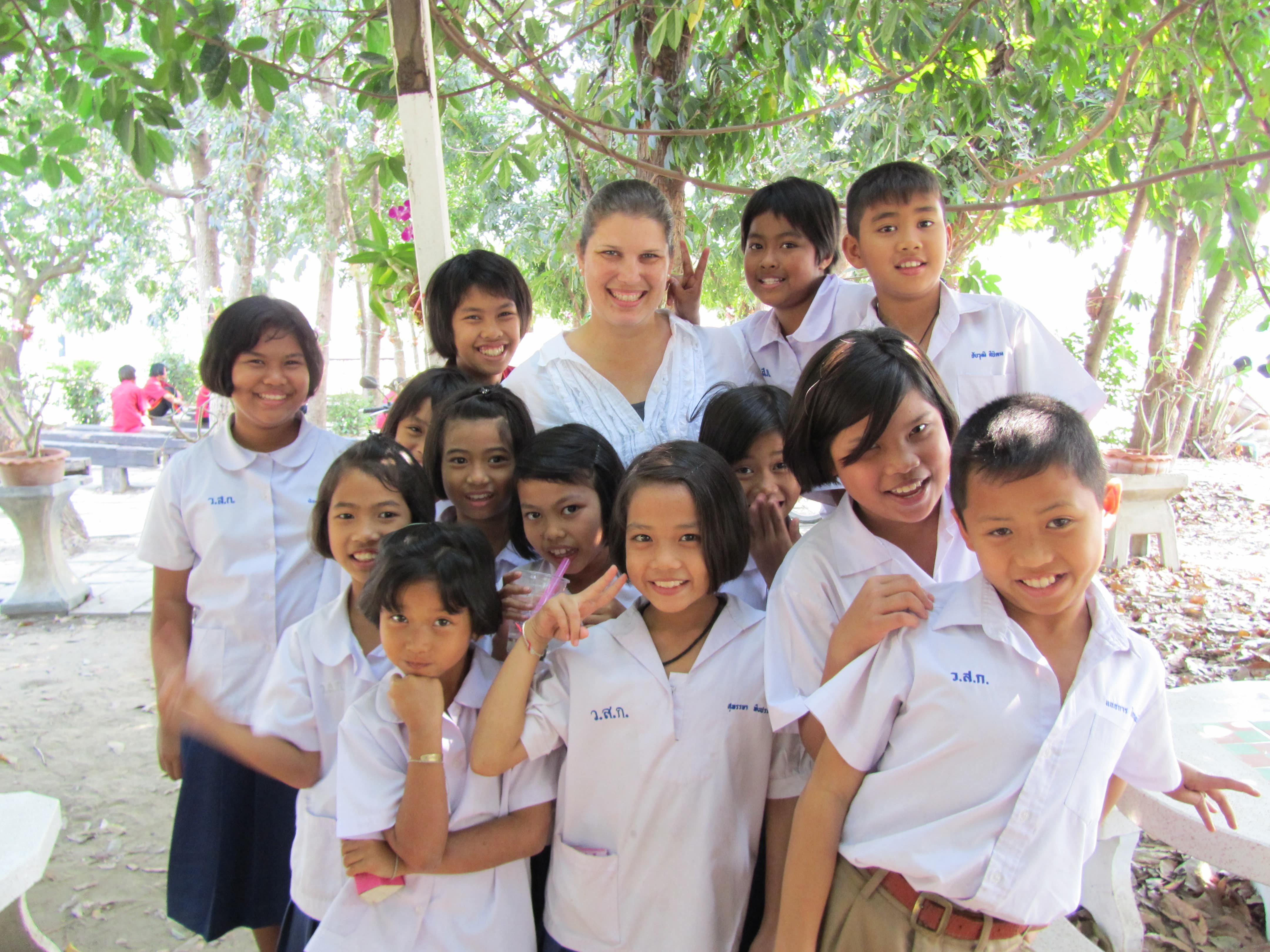Pam and local school children.
